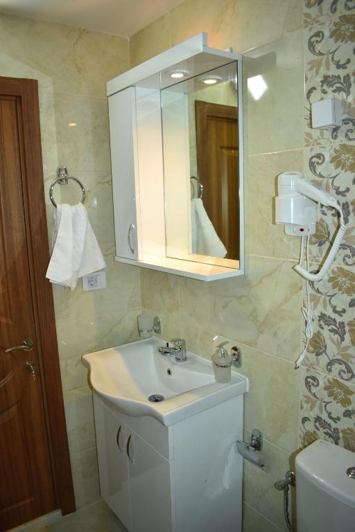 Koupelna v ubytování Apartments Fati