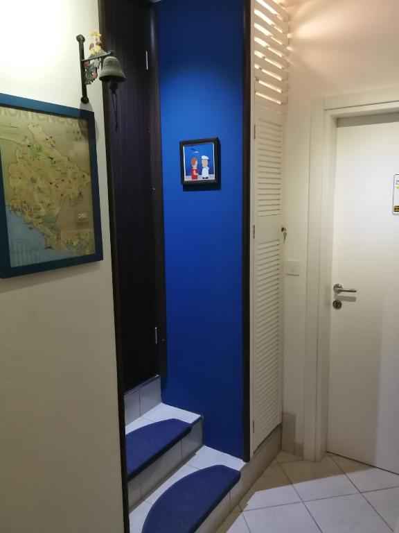 Un pat sau paturi într-o cameră la Apartments Paradiso