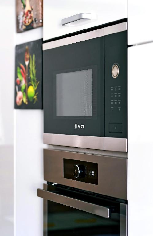 Kuchyň nebo kuchyňský kout v ubytování Apartment Luce
