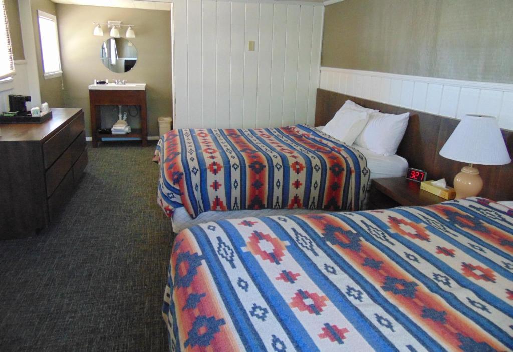 Postel nebo postele na pokoji v ubytování Bryce Canyon Resort
