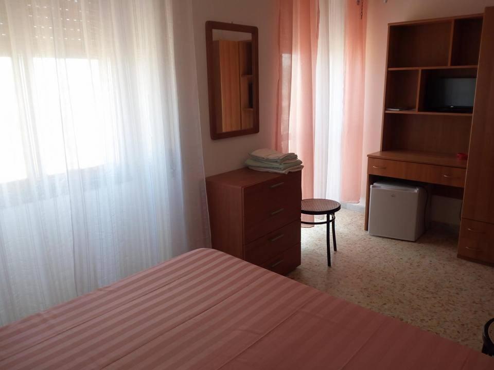 Postel nebo postele na pokoji v ubytování La Scogliera Bed & Breakfast