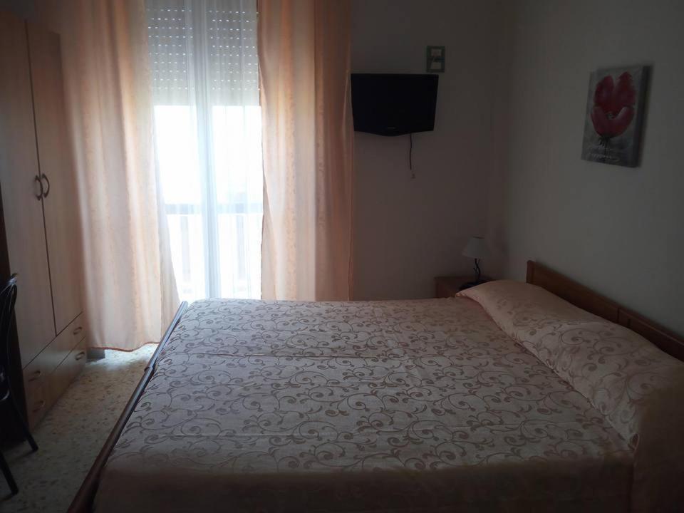 Postel nebo postele na pokoji v ubytování La Scogliera Bed & Breakfast