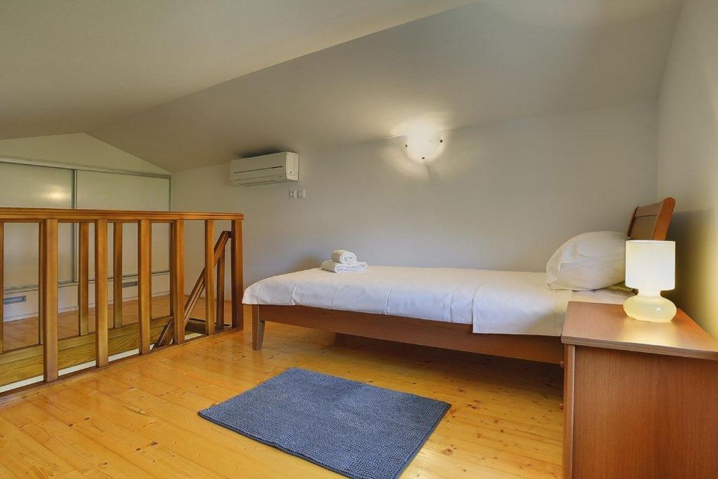 Postel nebo postele na pokoji v ubytování Villa Maria Betiga
