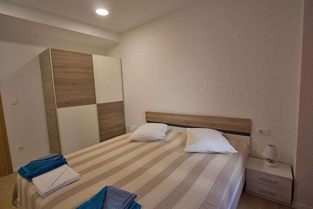 Posteľ alebo postele v izbe v ubytovaní Apartment Carlitos