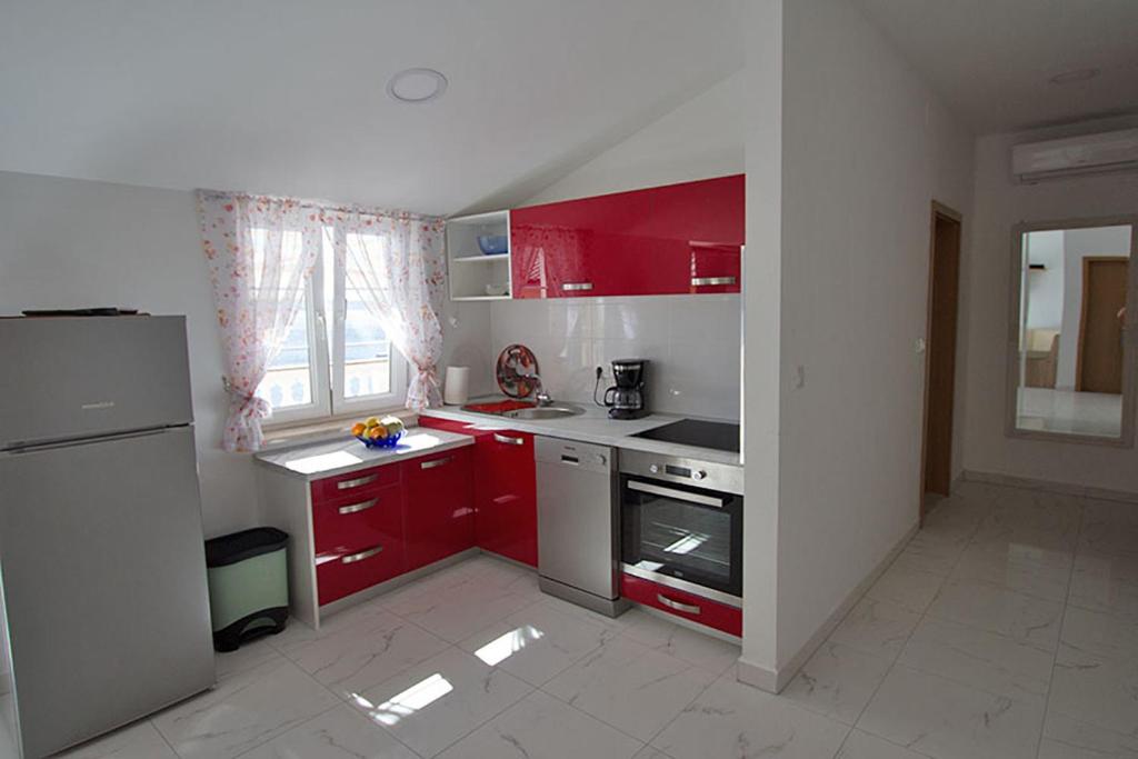 Kuchyňa alebo kuchynka v ubytovaní Apartment Carlitos