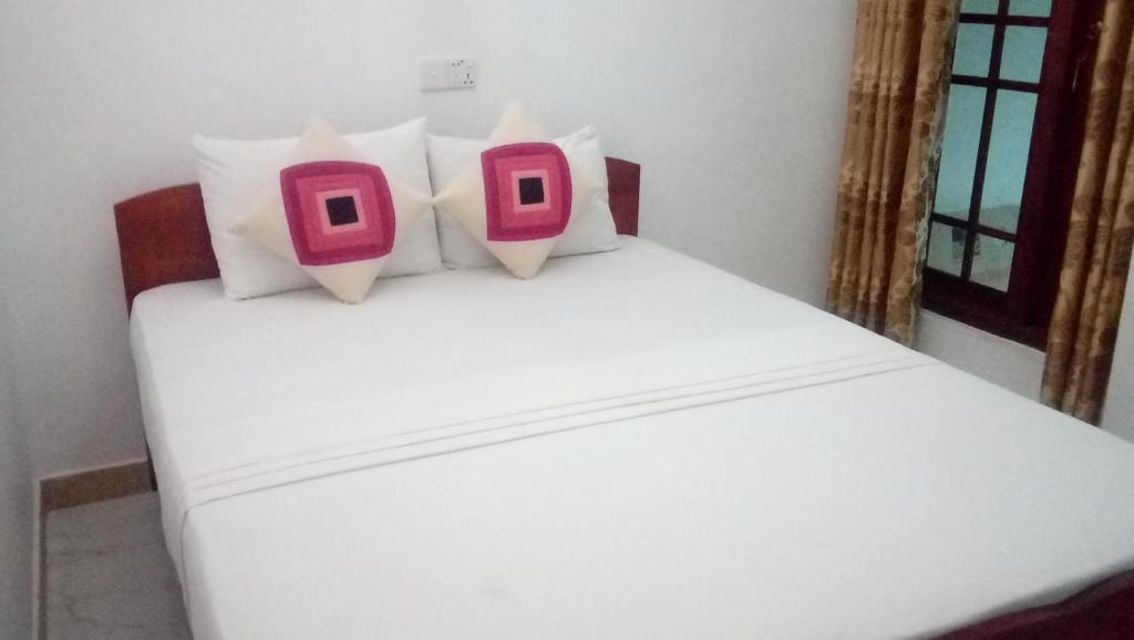 Postel nebo postele na pokoji v ubytování Daban Homestay Ella