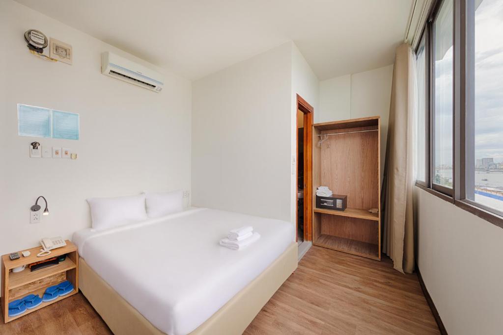 Postel nebo postele na pokoji v ubytování Vitalis Riverside Hotel