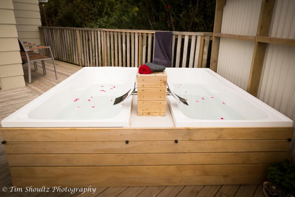 Whare Manu Boutique Cottage - Resim 12