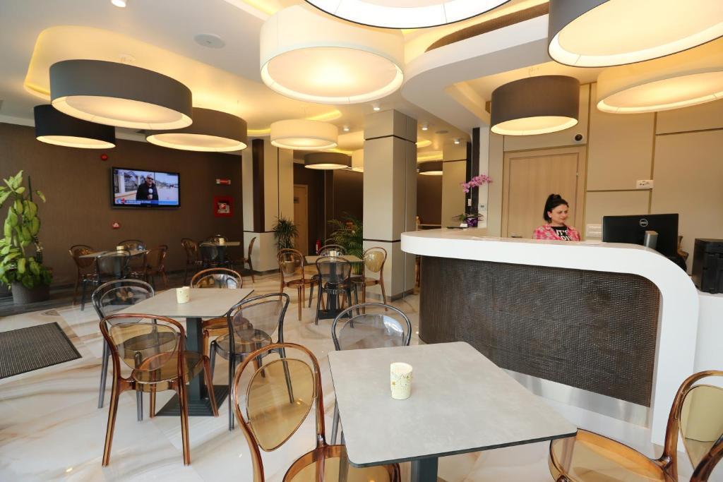 TV a/nebo společenská místnost v ubytování Hotel Baril