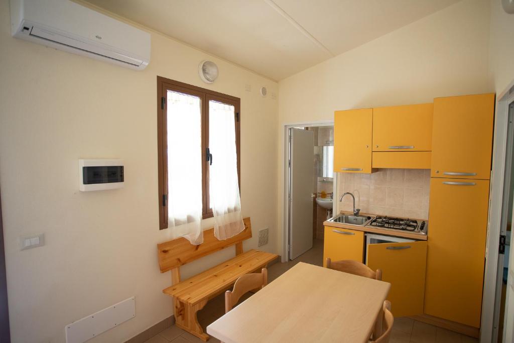Kuchyň nebo kuchyňský kout v ubytování Camping Village Viareggio