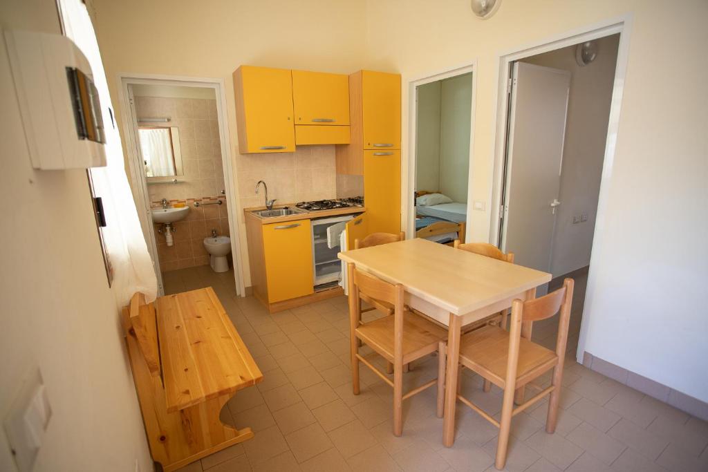 Kuchyň nebo kuchyňský kout v ubytování Camping Village Viareggio