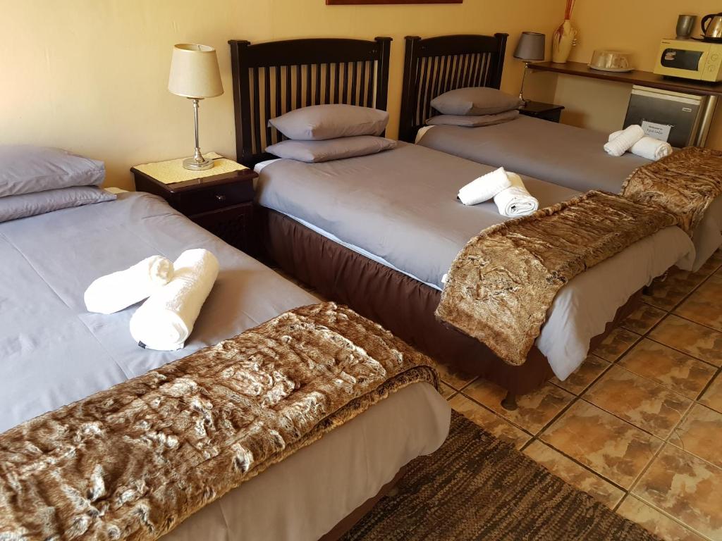 Kgosi Lodge - Basic Triple Room