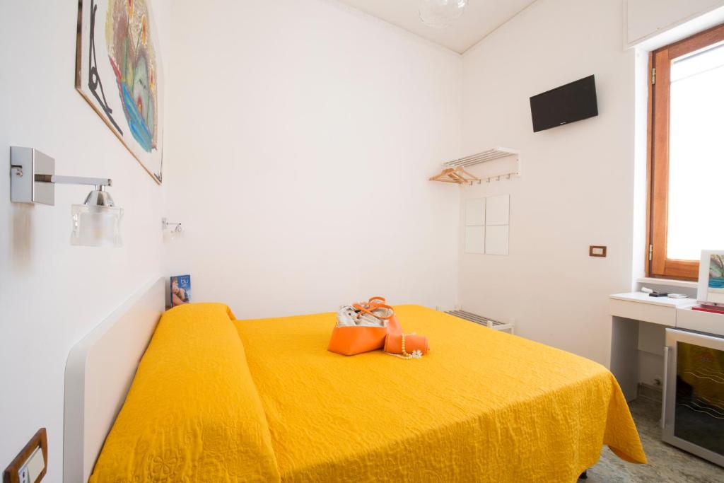Postel nebo postele na pokoji v ubytování B&B Teta Vieste