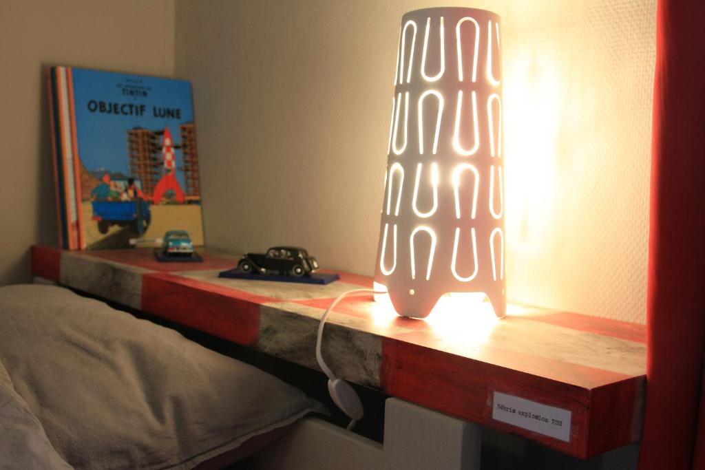 Postel nebo postele na pokoji v ubytování Les Hauts de Crupet