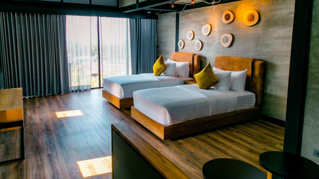 Postel nebo postele na pokoji v ubytování Vino Neste Private Pool Villas