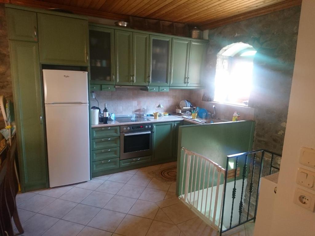 Kuchyň nebo kuchyňský kout v ubytování Samothraki