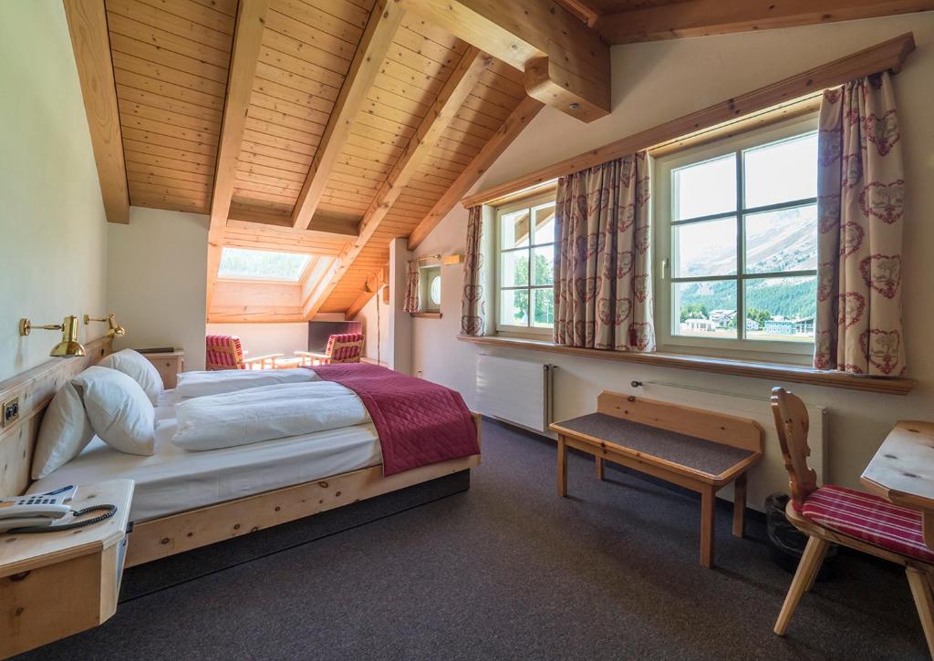 Postel nebo postele na pokoji v ubytování Hotel Maria