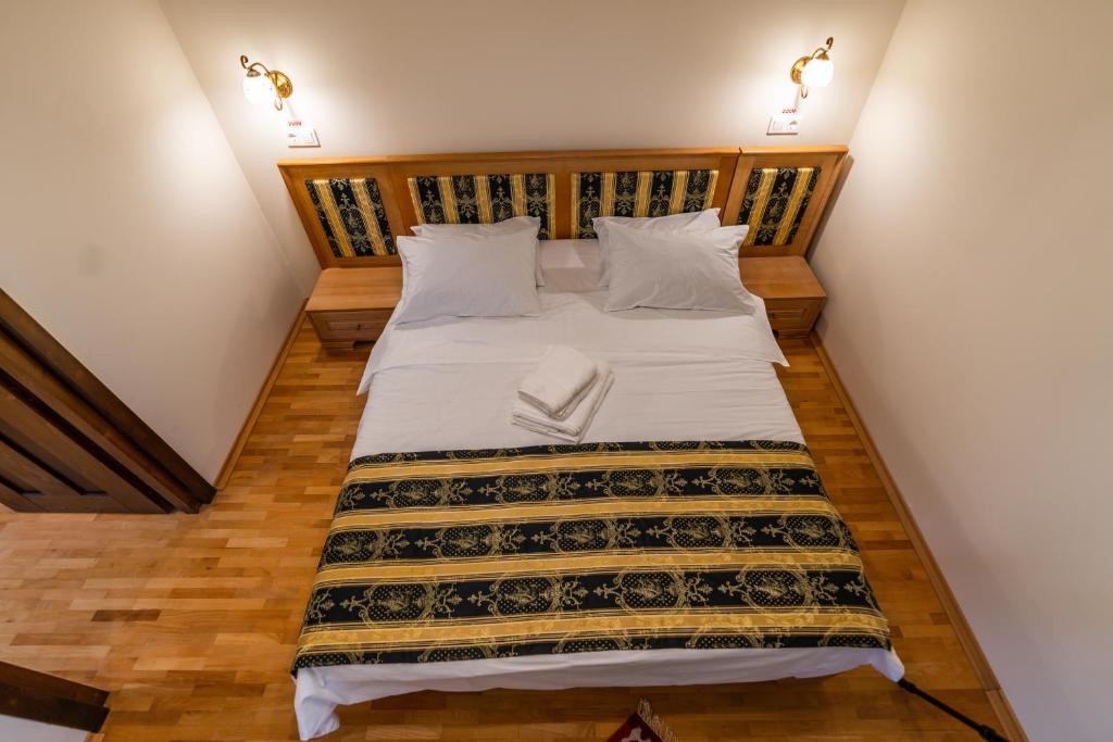 Postel nebo postele na pokoji v ubytování Felix Pension