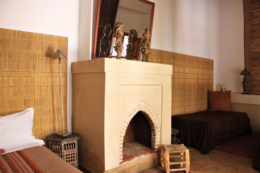Postel nebo postele na pokoji v ubytování Riad Miski