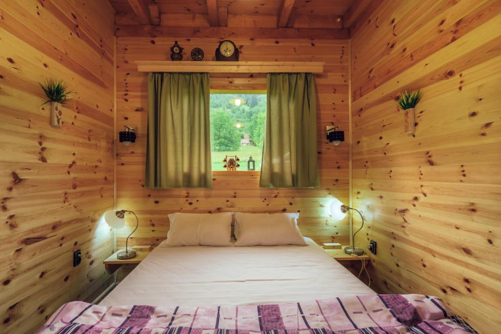 Letto o letti in una camera di Chalet Tara