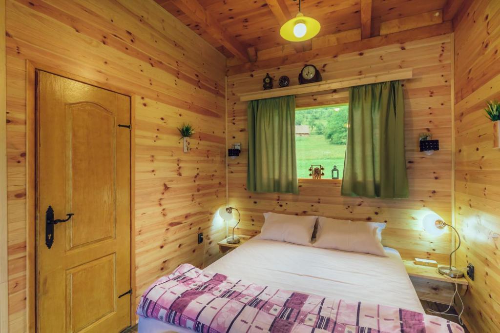 Letto o letti in una camera di Chalet Tara