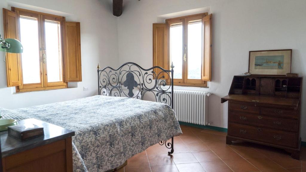 Postel nebo postele na pokoji v ubytování Casa Ollie