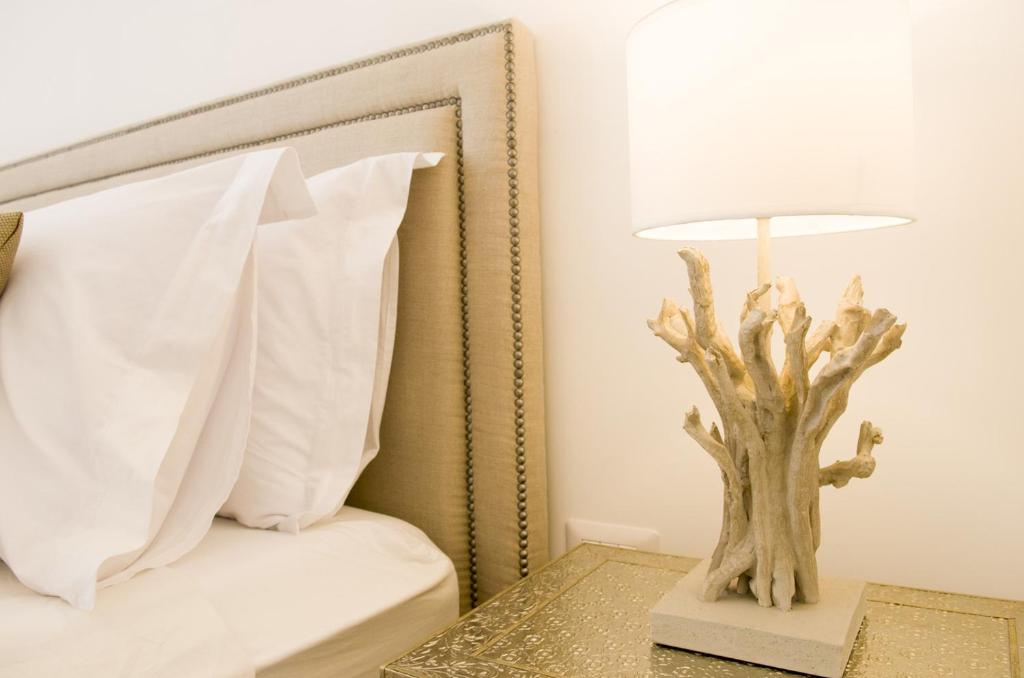 Posteľ alebo postele v izbe v ubytovaní Palazzo Spasiano rooms - SORRENTO CENTER