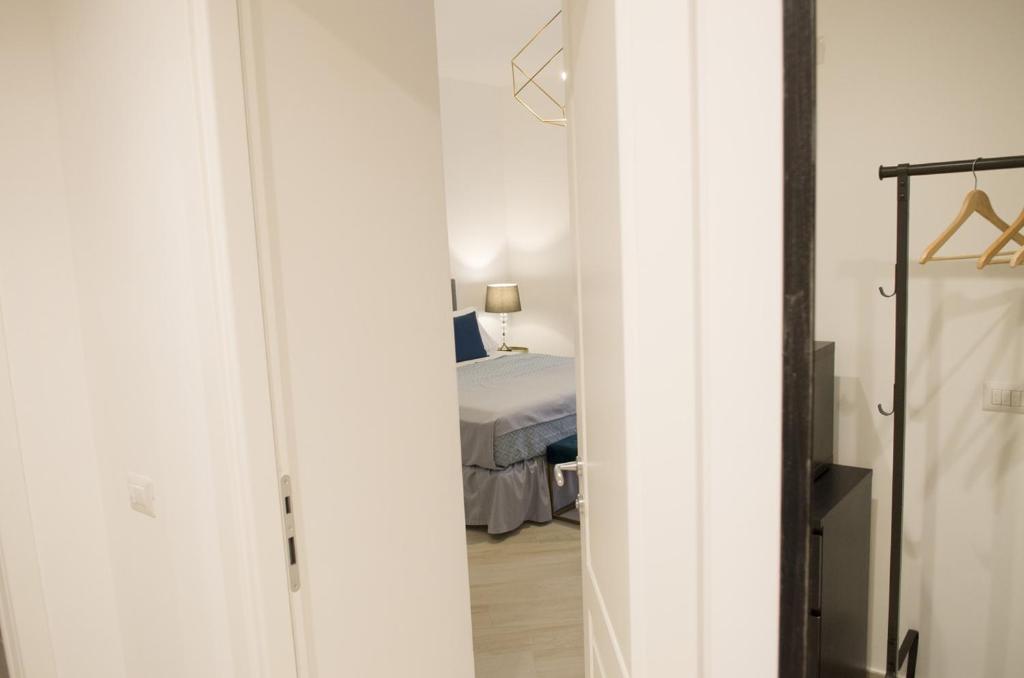 Posteľ alebo postele v izbe v ubytovaní Palazzo Spasiano rooms - SORRENTO CENTER