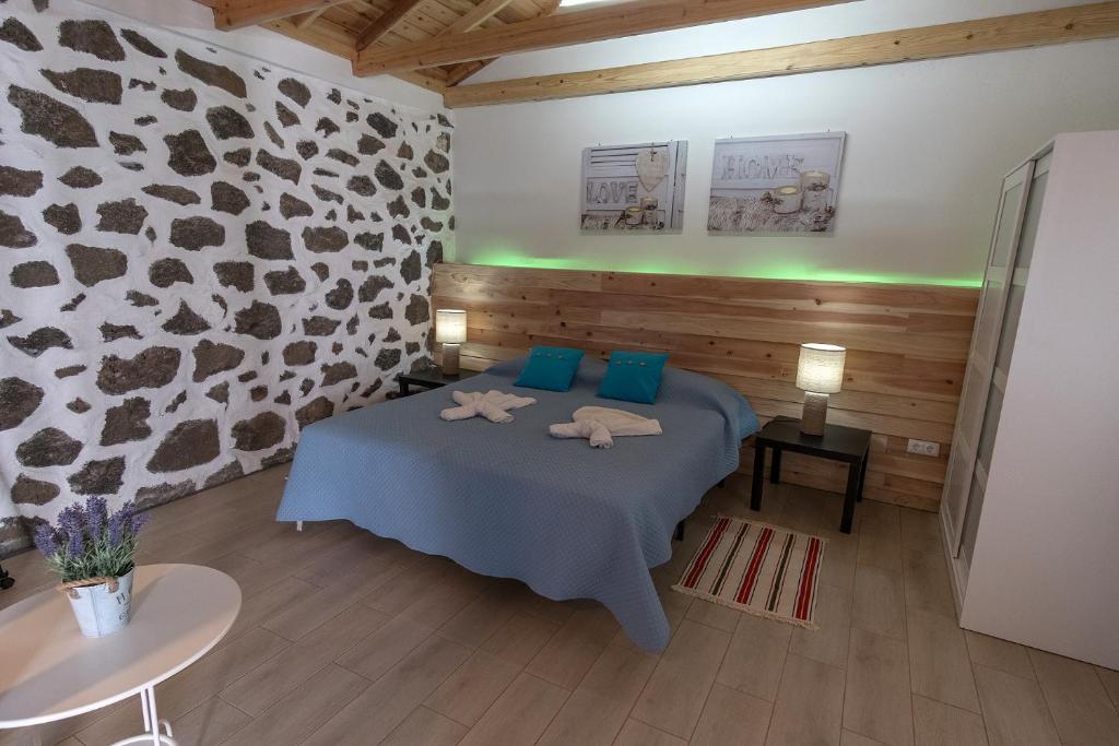Postel nebo postele na pokoji v ubytování Casa do Bica