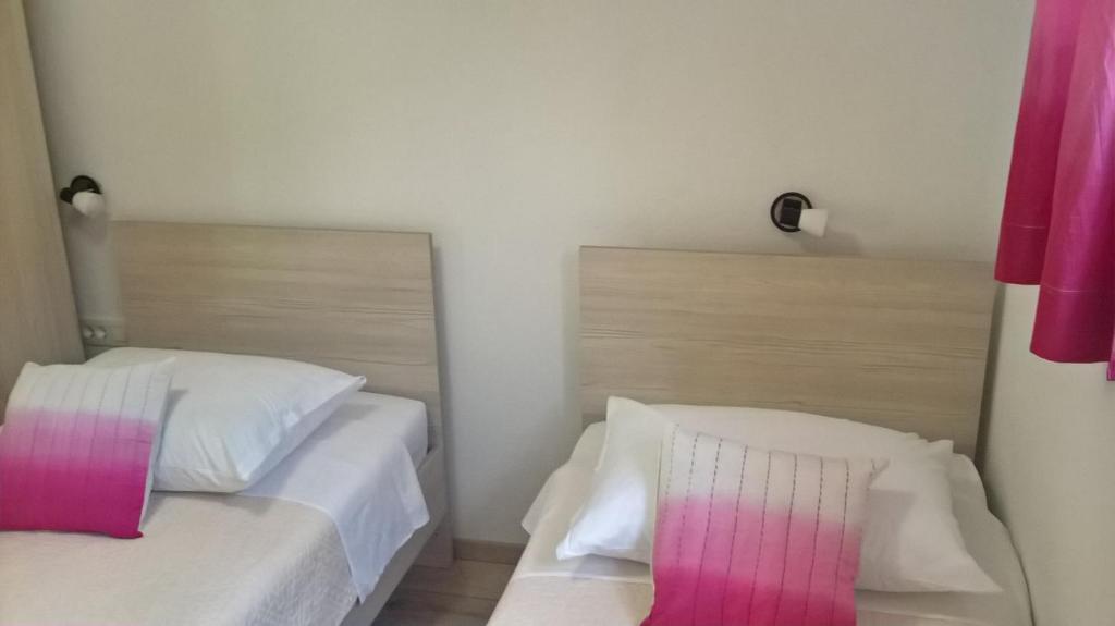 Posteľ alebo postele v izbe v ubytovaní Apartman Zaklopatica