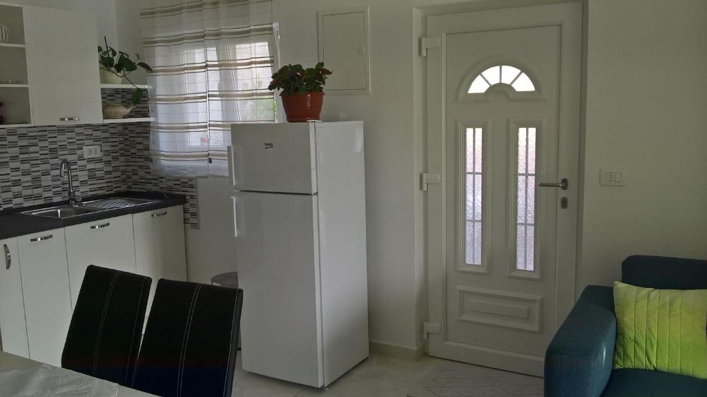 Kuchyňa alebo kuchynka v ubytovaní Apartman Zaklopatica