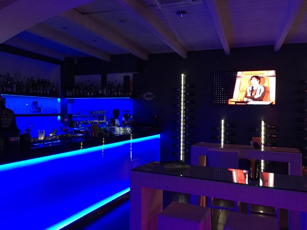 TV a/nebo společenská místnost v ubytování Bellini Relais