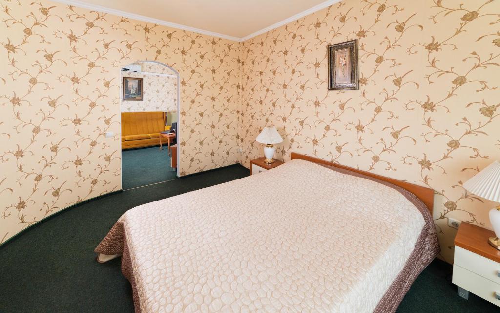Postel nebo postele na pokoji v ubytování Hotel Hottey