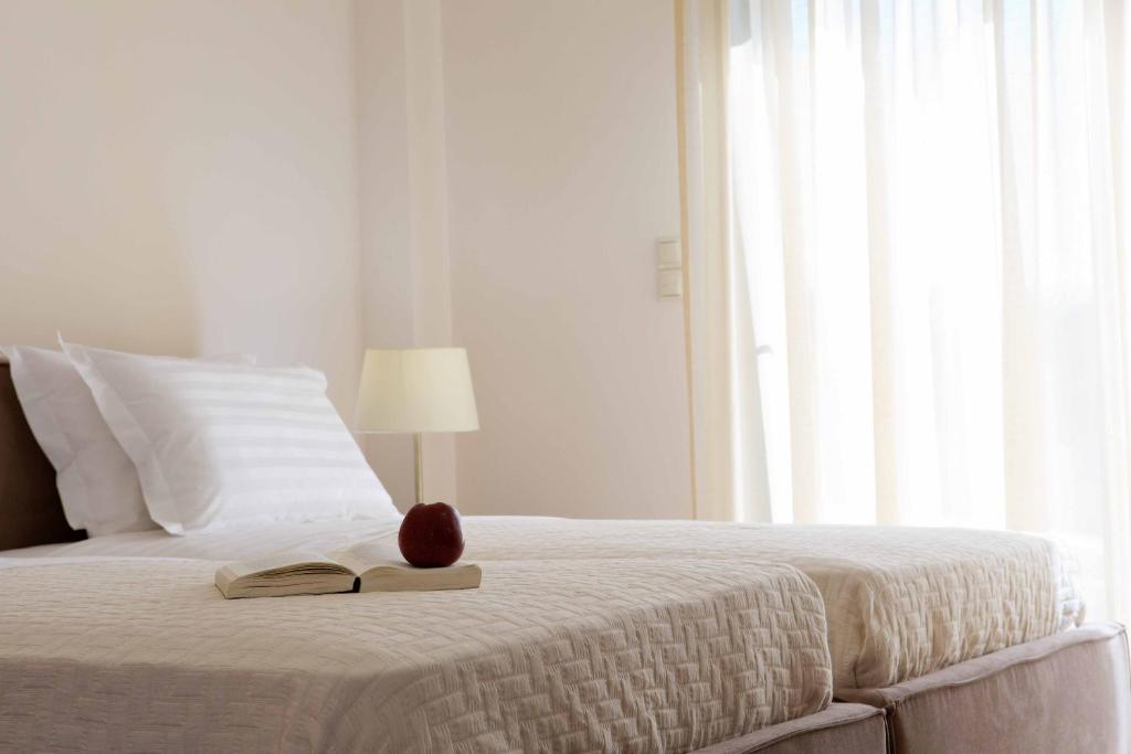 A bed or beds in a room at Nema Villa