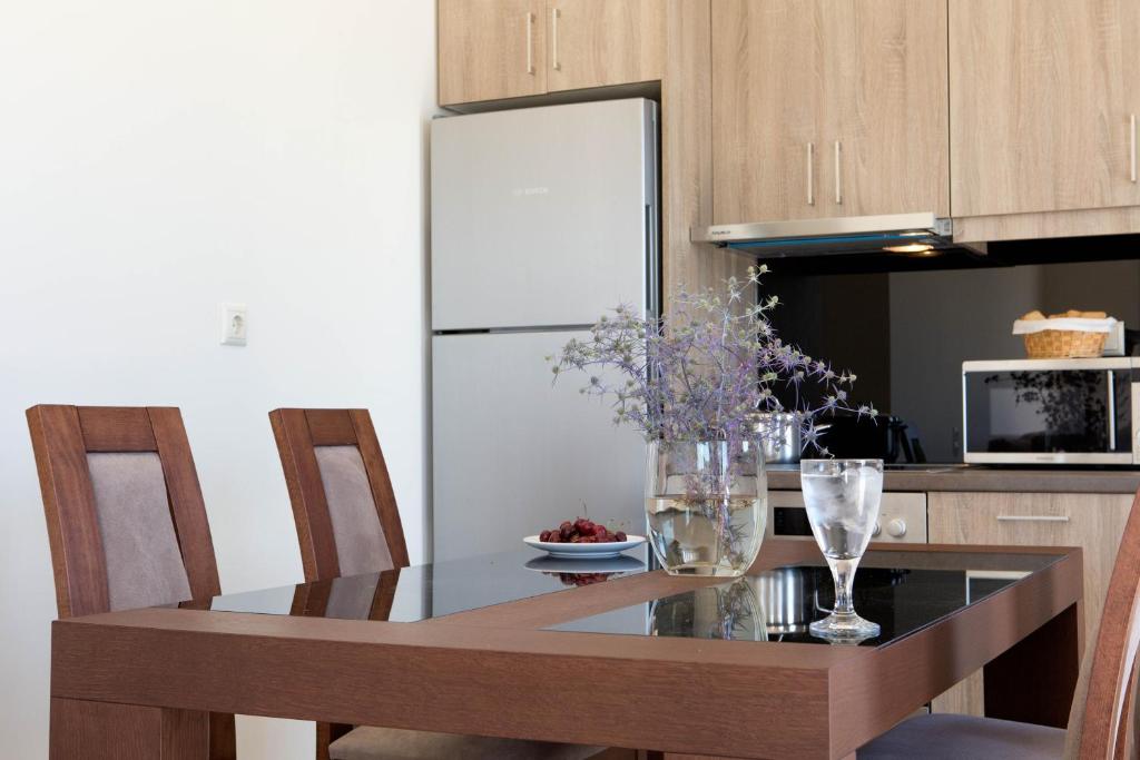 A kitchen or kitchenette at Nema Villa