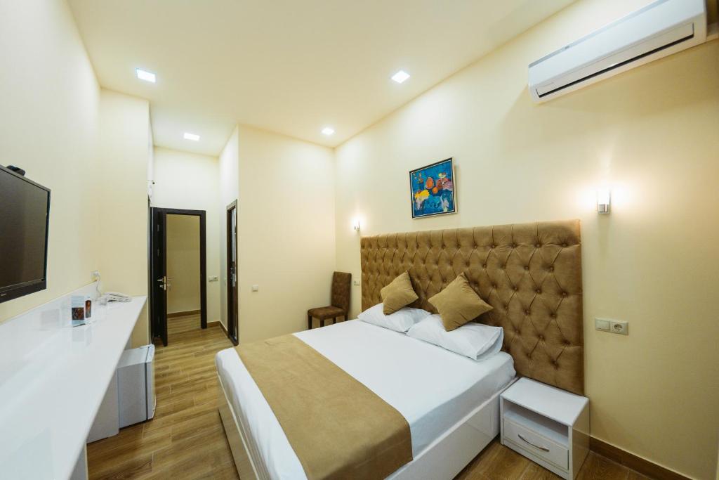 Postel nebo postele na pokoji v ubytování L'image Art Hotel