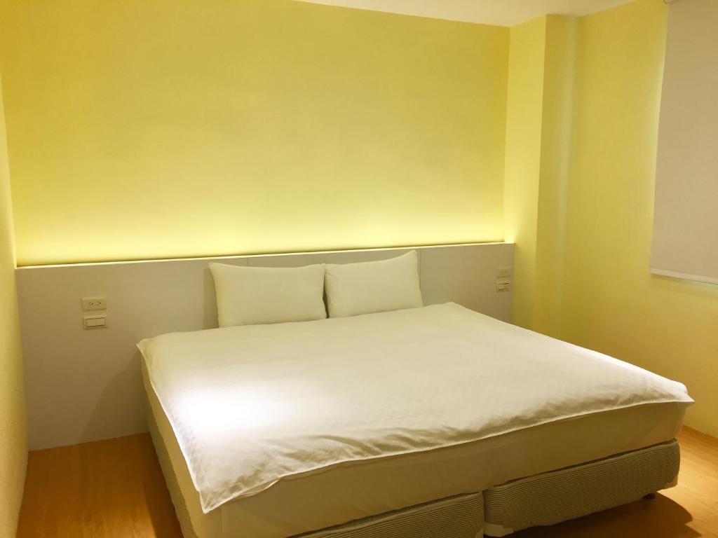 Postel nebo postele na pokoji v ubytování Taimali Hotel