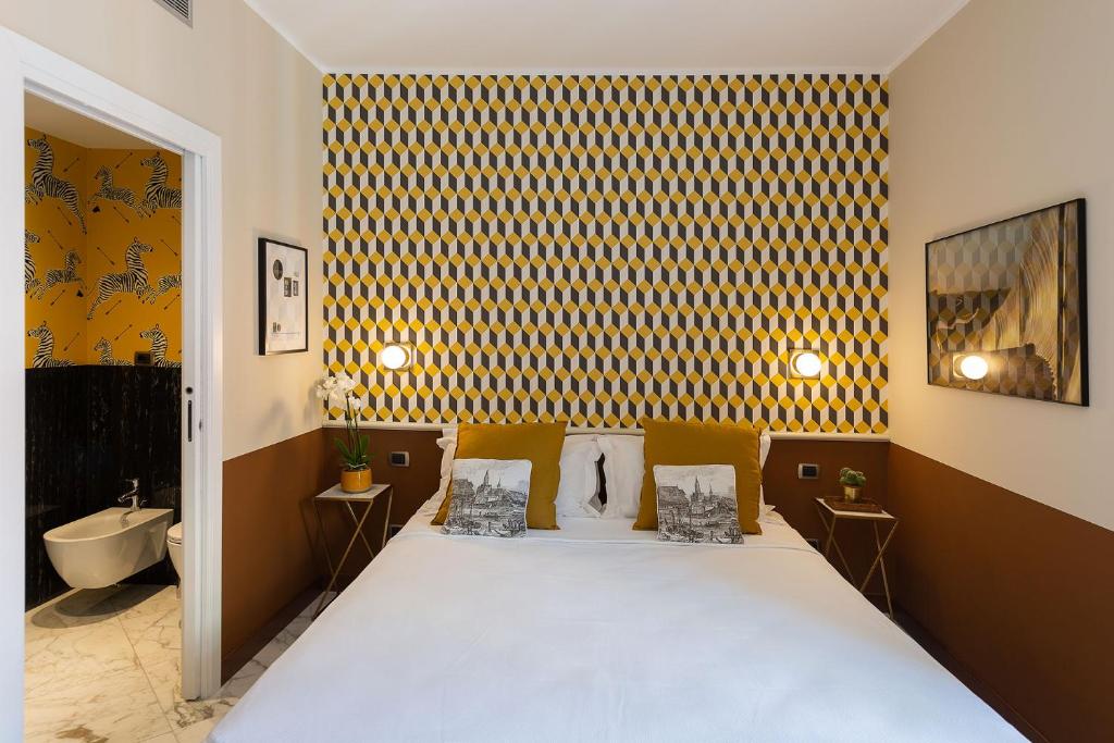 A bed or beds in a room at Zebra Naviglio