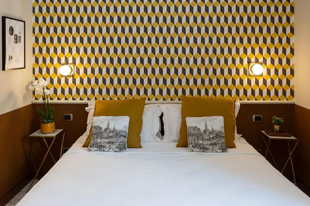 A bed or beds in a room at Zebra Naviglio
