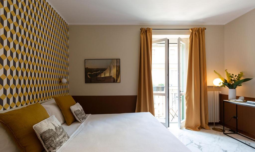 A bed or beds in a room at Zebra Naviglio