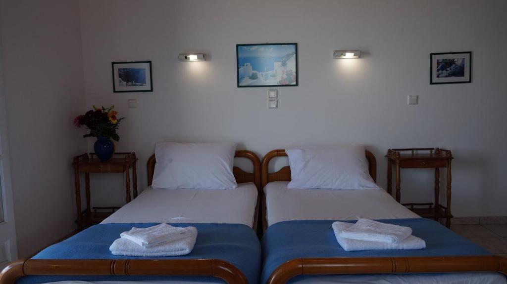 Postel nebo postele na pokoji v ubytování Hotel Hara