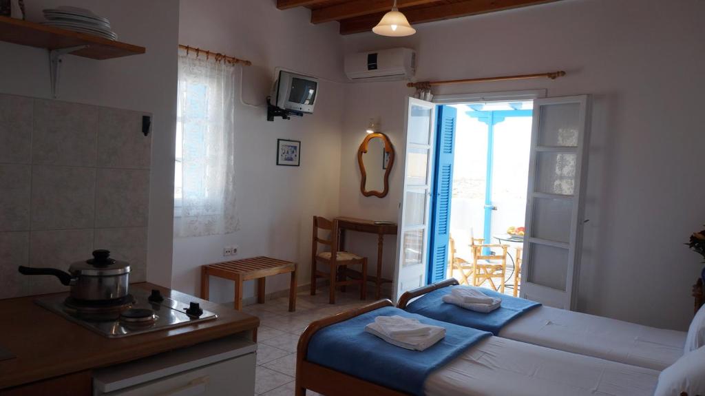 Postel nebo postele na pokoji v ubytování Hotel Hara