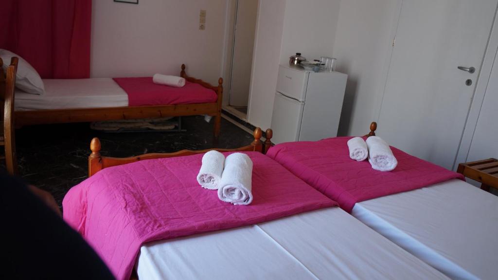 Postel nebo postele na pokoji v ubytování Hotel Hara