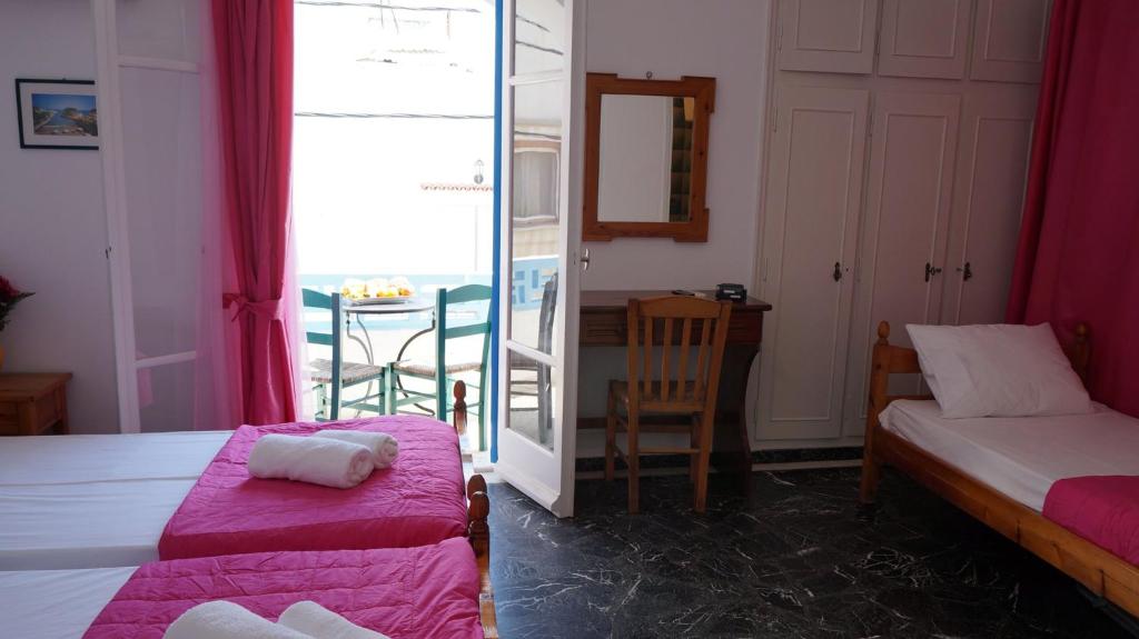 Postel nebo postele na pokoji v ubytování Hotel Hara