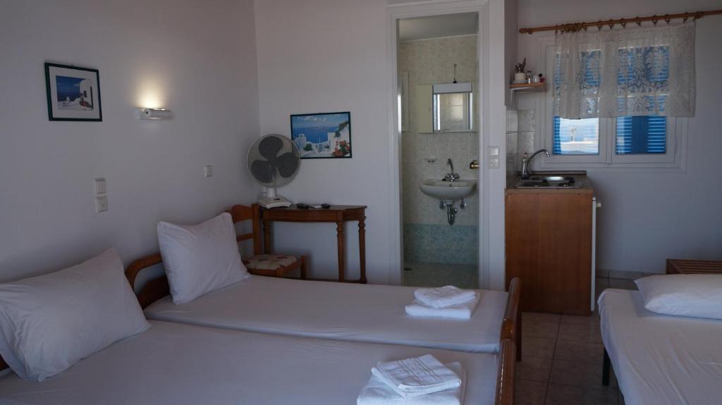 Postel nebo postele na pokoji v ubytování Hotel Hara