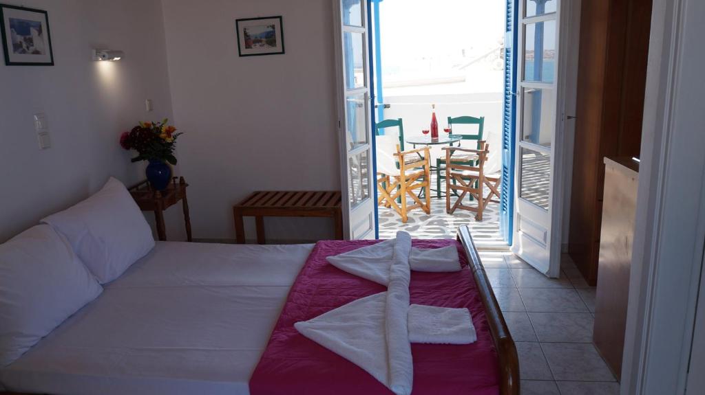 Postel nebo postele na pokoji v ubytování Hotel Hara
