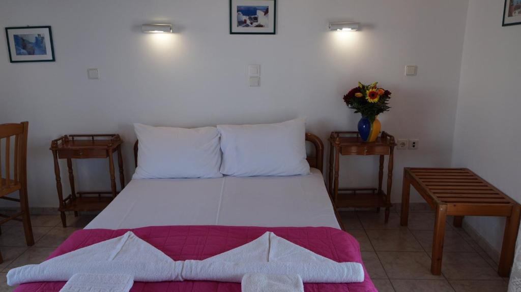 Postel nebo postele na pokoji v ubytování Hotel Hara