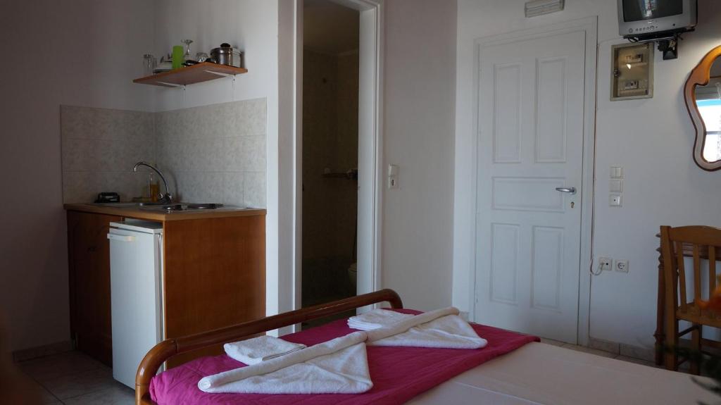 Postel nebo postele na pokoji v ubytování Hotel Hara