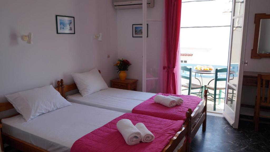 Postel nebo postele na pokoji v ubytování Hotel Hara