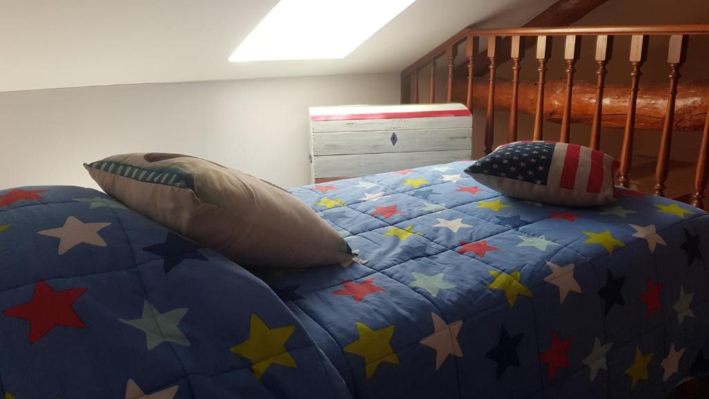 Postel nebo postele na pokoji v ubytování Au Coq Bleu